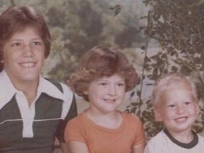 The picture shows Richie, Endy, and Blake Shelton sitting next to each other as they are looking slightly away from the camera.